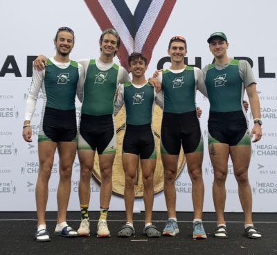 Bennett Rossell with a crew after a regatta